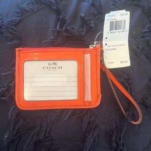 Coach mini orange wristlet ID case